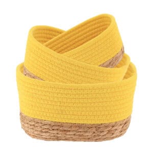 Set of three yellow cotton rope storage baskets with natural seagrass bases, shown nested and stacked on a white background.