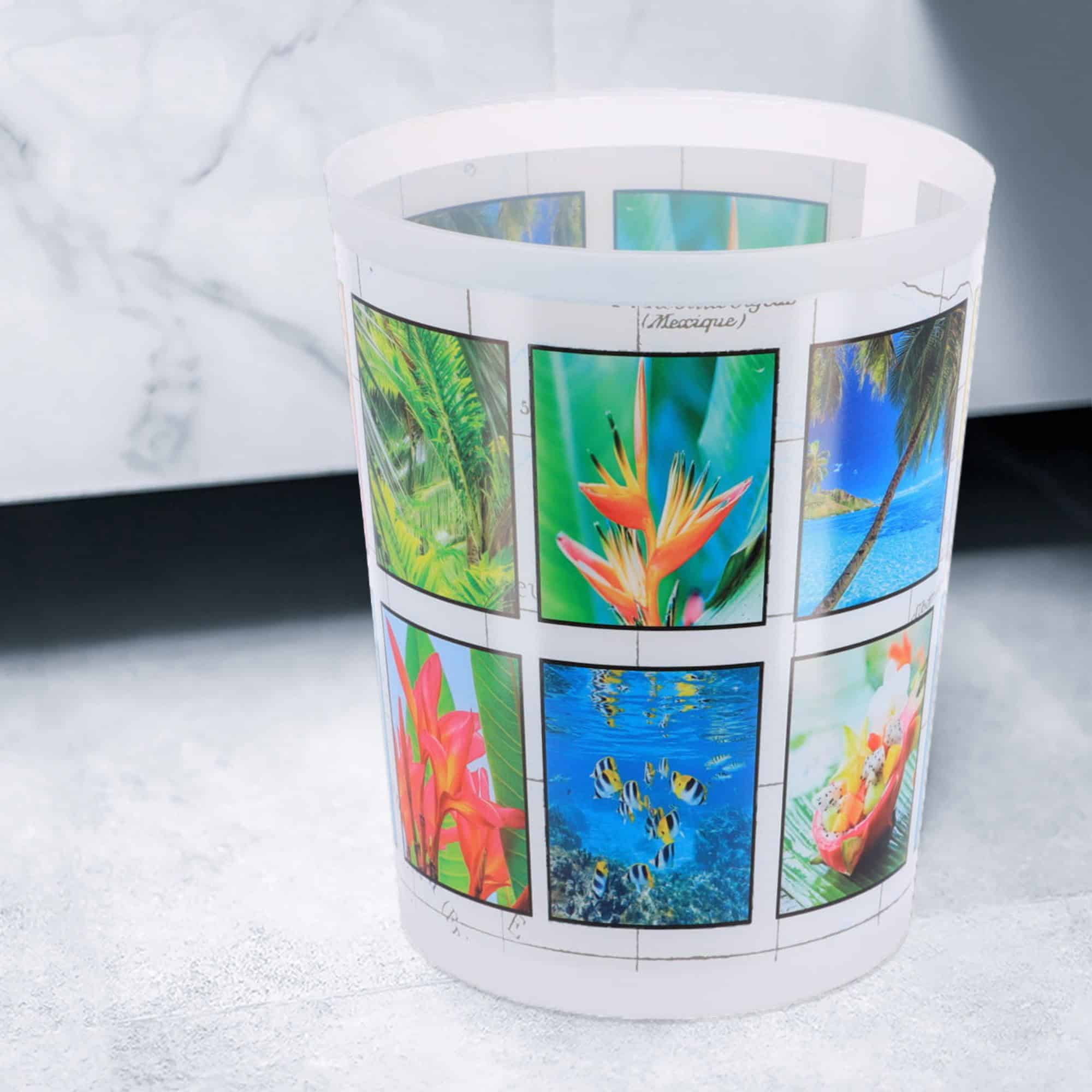 Image 8: Close-up of tropical-print waste basket on bathroom floor