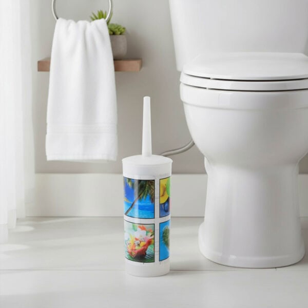 "Decorative toilet brush with island imagery next to white toilet"