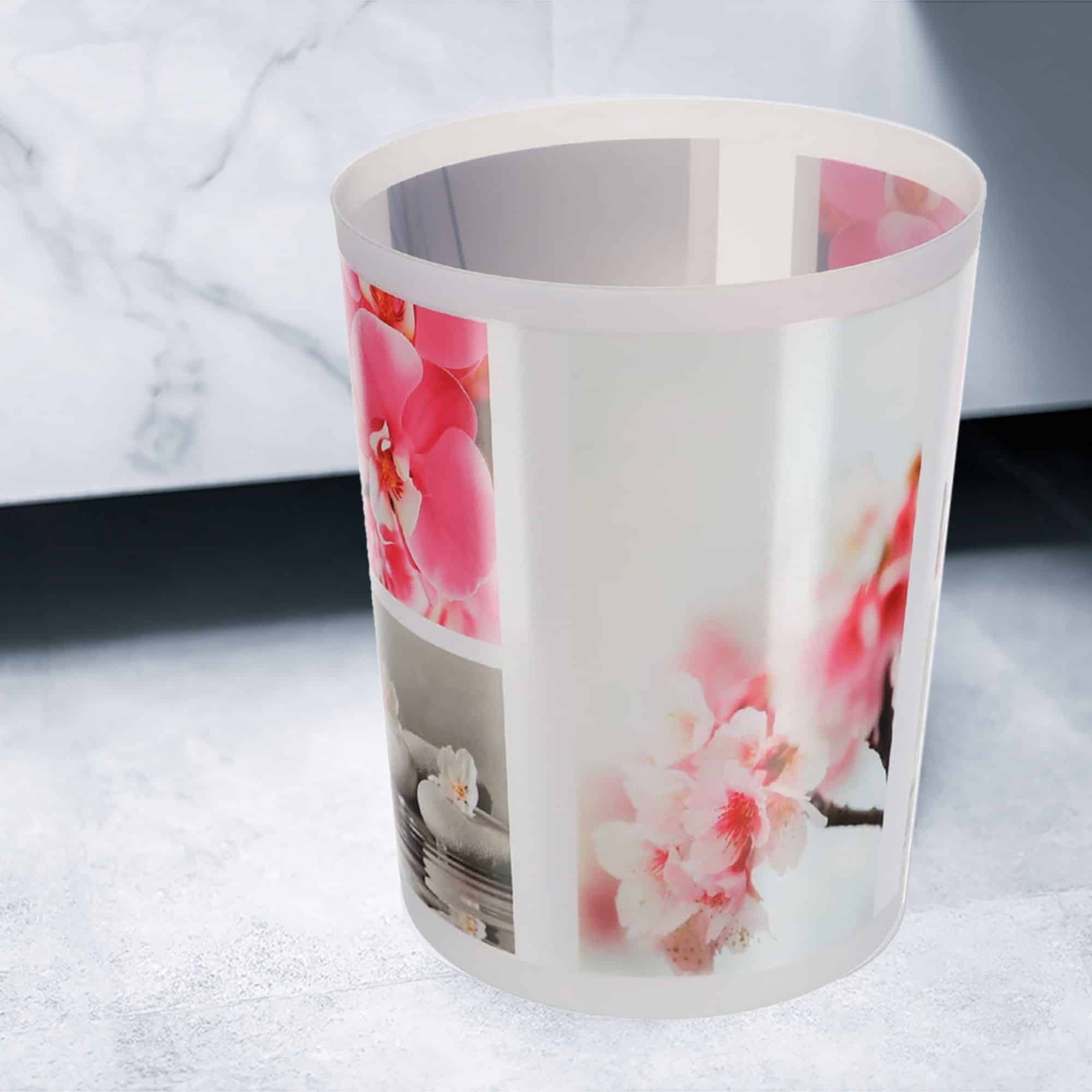relaxing design of orchids, cherry blossoms and stones in pink and gray tones