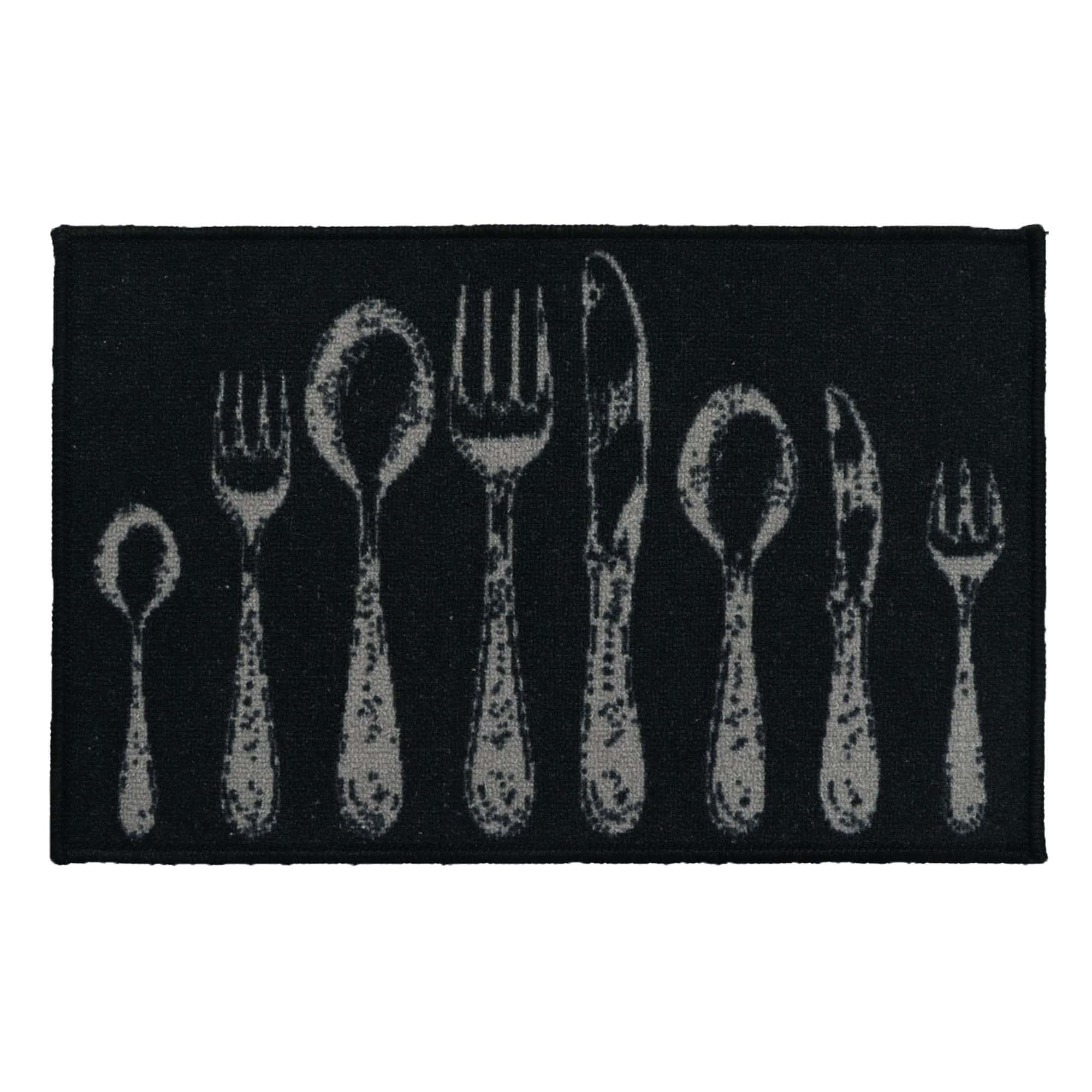Black kitchen mat printed with light gray fork, spoon, and knife silhouettes in a row, shown flat on a white background for a clear product view.