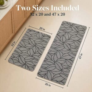 Grey leaf-print kitchen mat set showing both included sizes, thirty-two by twenty inches and forty-seven by twenty inches, with measurement arrows.