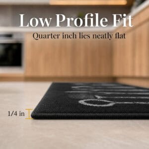 Side view of the black kitchen set resting flat on the floor, labeled one quarter inch to show its slim low profile height.
