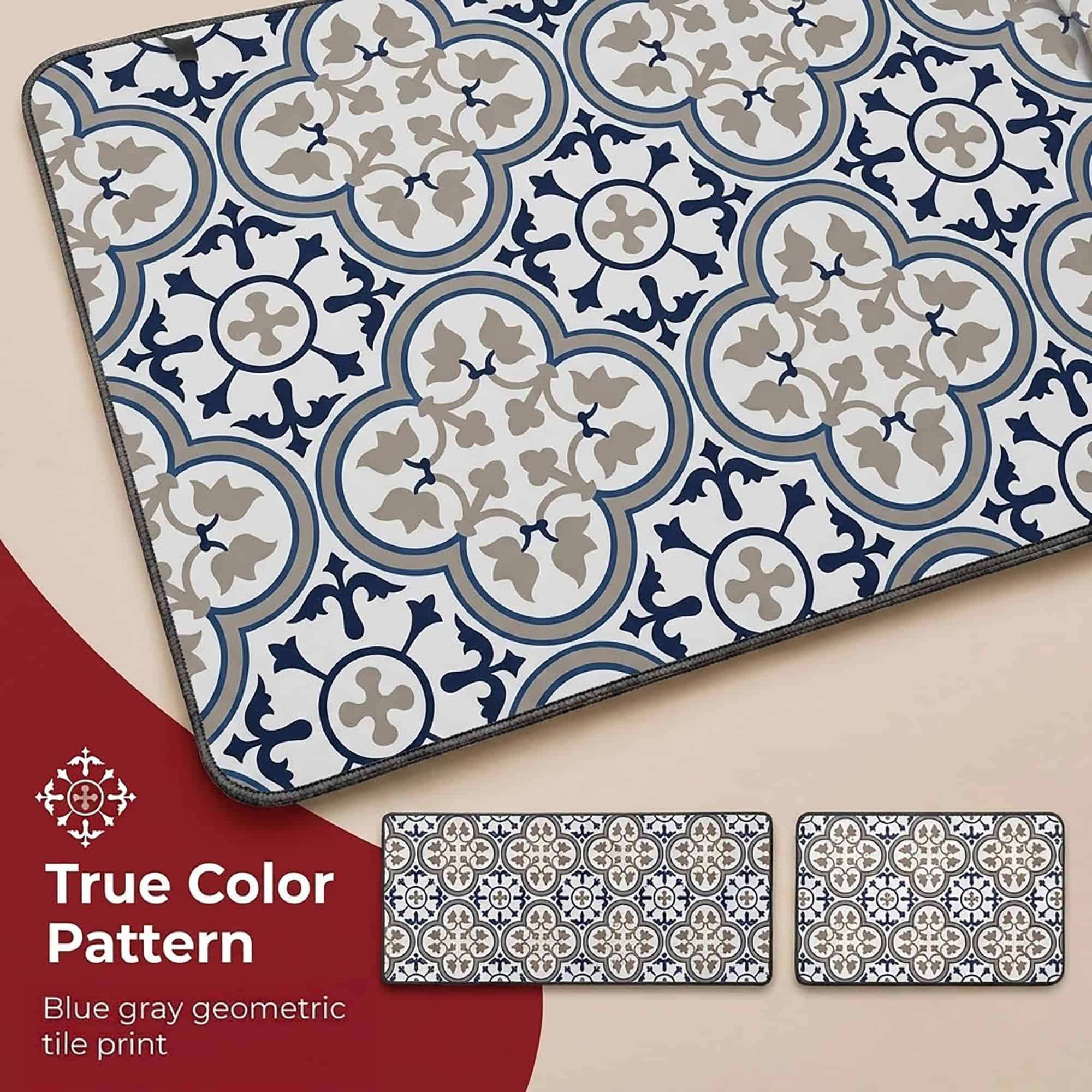 Close-up of the kitchen mat surface, highlighting the blue and gray geometric tile print with its quatrefoil and floral motifs in crisp detail.