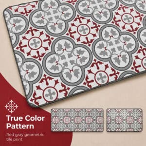 Close-up of the kitchen mat surface, highlighting the red and gray geometric tile print with its quatrefoil and floral motifs in crisp detail.