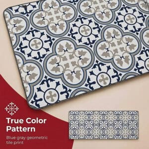Close-up of the kitchen runner surface showing the blue and gray geometric tile print with quatrefoil and floral motifs in sharp, true color detail.
