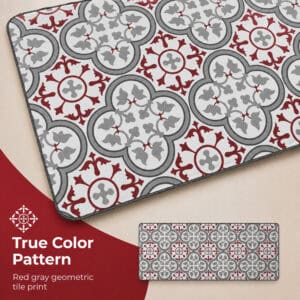 Close-up of the kitchen runner surface showing the red and gray geometric tile print with quatrefoil and floral motifs in sharp, true color detail.