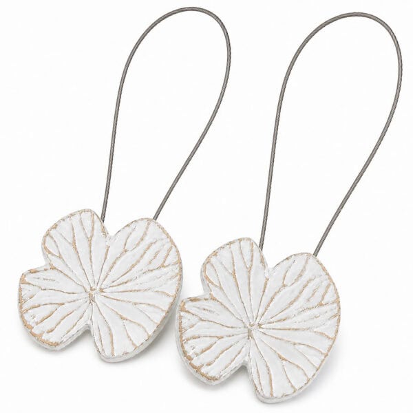 Hero: Set of 2 white whitewashed water lily magnetic curtain tiebacks with gold-toned carved veins on white