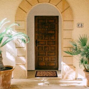 other view of the sheltered door mat outside at entrance door