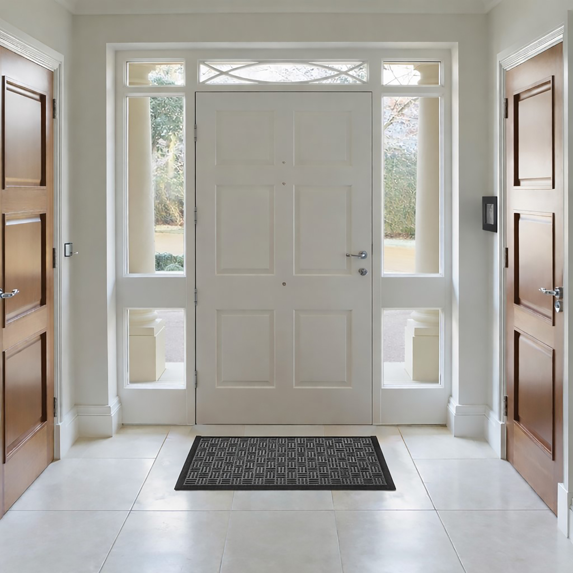 Gray indoor outdoor doormat at home entrance with glass sidelights