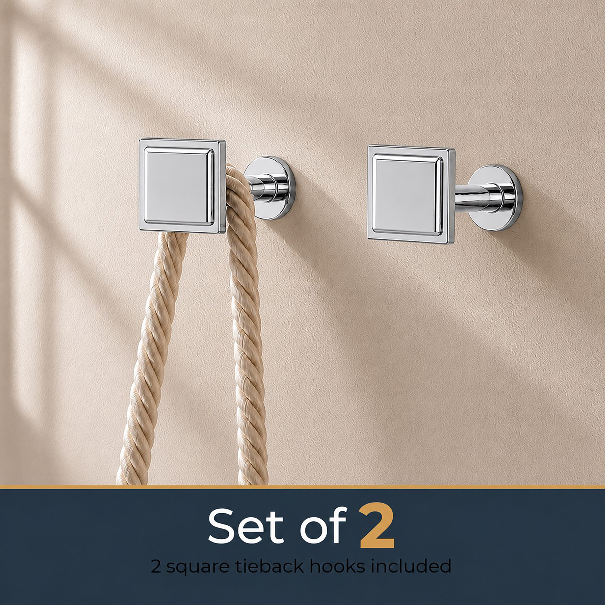 Set of 2 chrome square curtain tieback hooks mounted on a beige wall, one holding a rope tieback