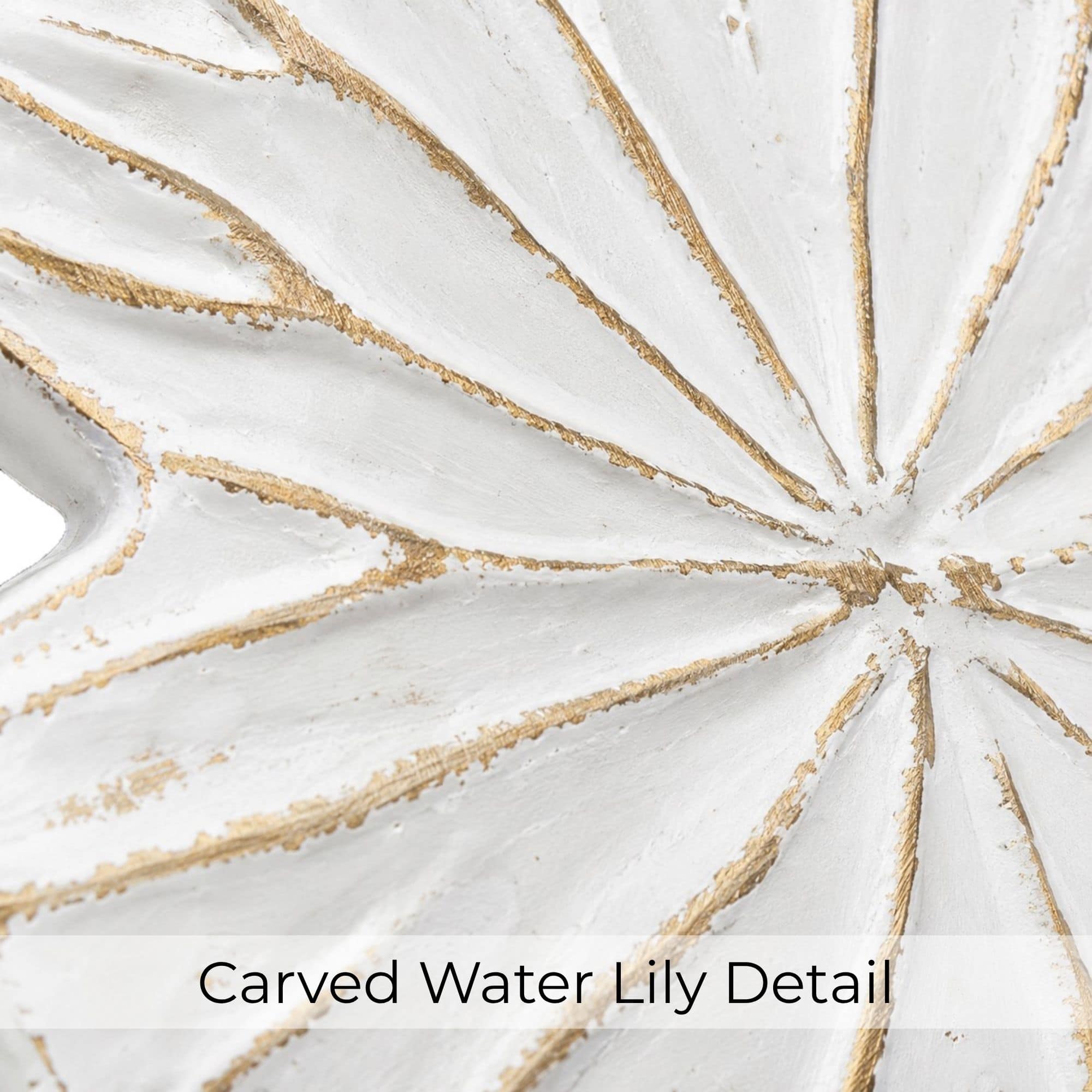 Macro texture: Close-up of the hand-finished whitewashed water lily leaf with carved veins and gold patina detail