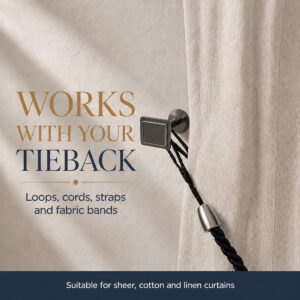 Graphite square tieback hook holding a black cord tieback on a cream curtain, fits loops, cords and fabric bands