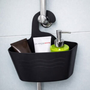 Black plastic hanging shower caddy on shower rod with toiletries and green soap dispenser