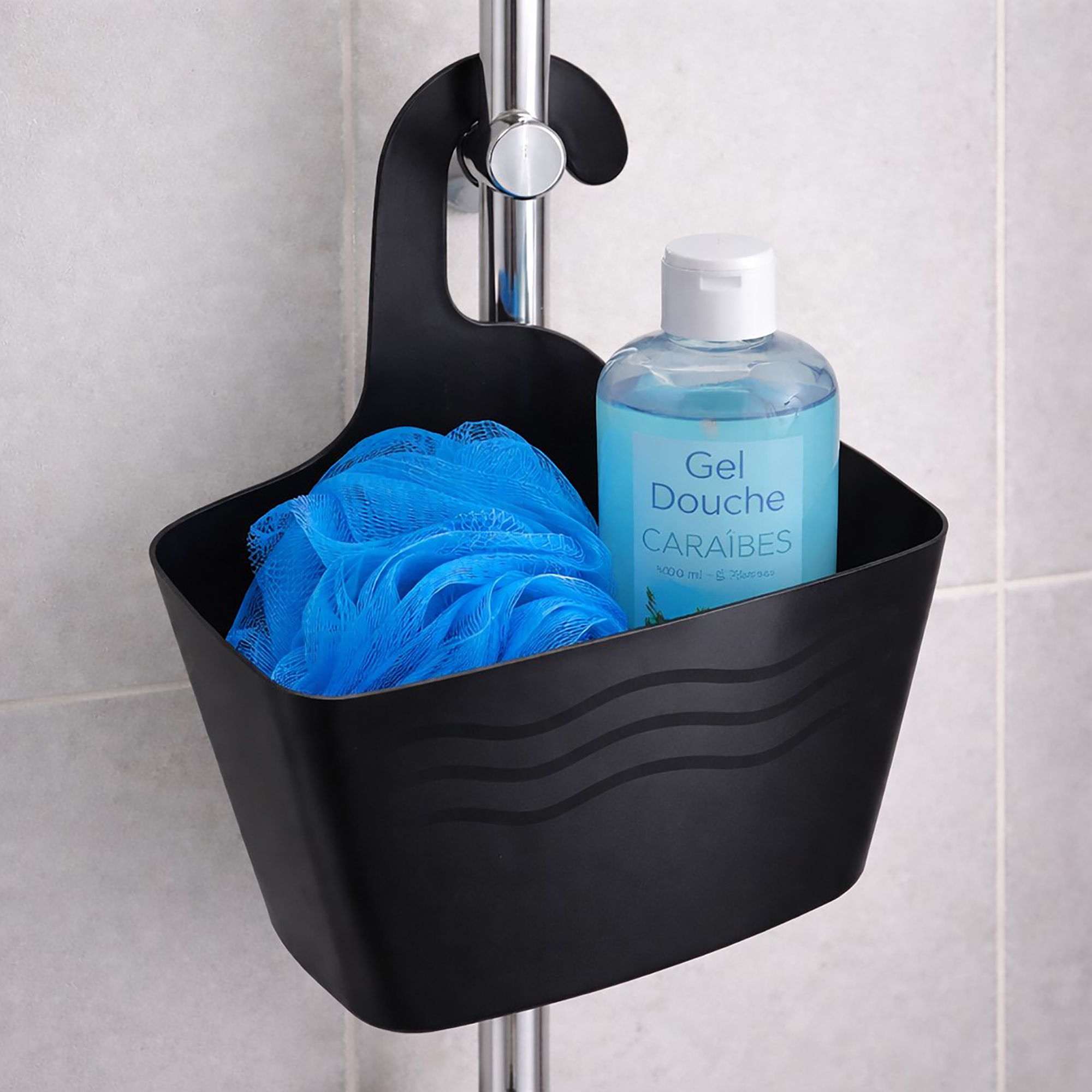 Black hanging shower caddy on chrome shower rod with blue loofah and shower gel
