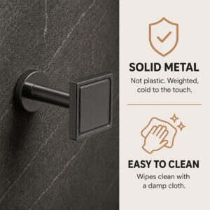 Solid metal graphite square tieback hook on a dark marble wall, wipes clean with a damp cloth