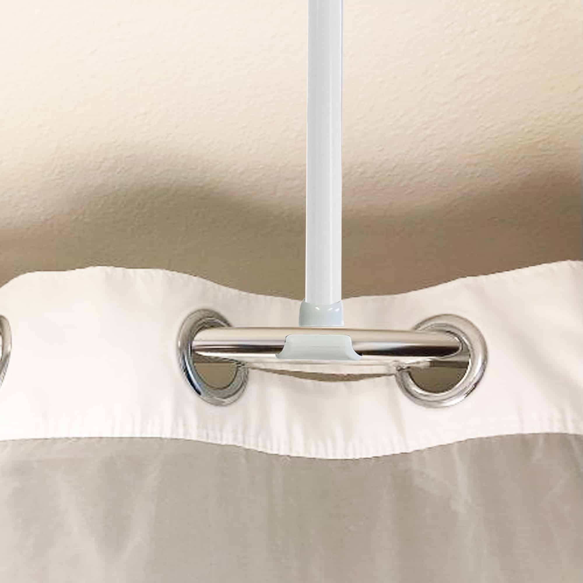 Detail of white ceiling support rod for shower curtain rail with secure clip-on attachment