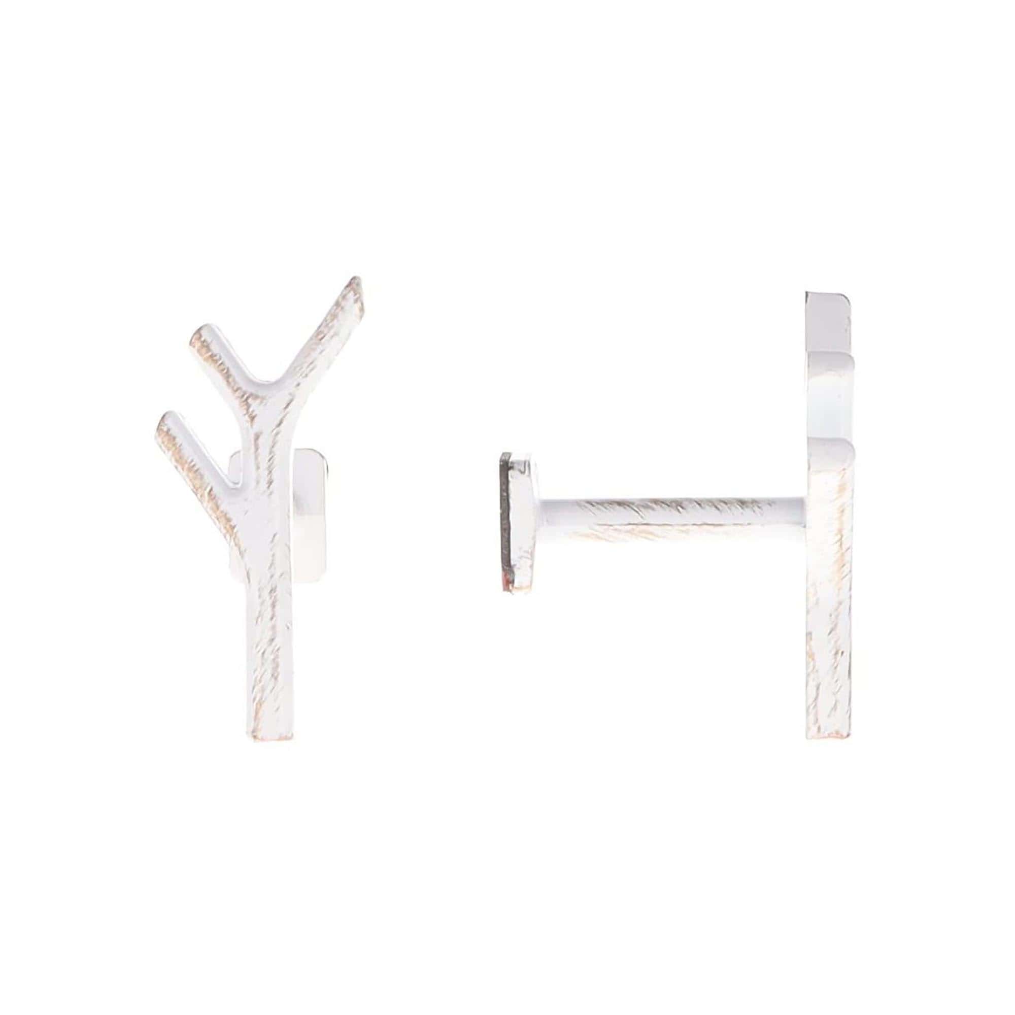 pair of metal hooks for curtain holdbacks in white and gold with natural design