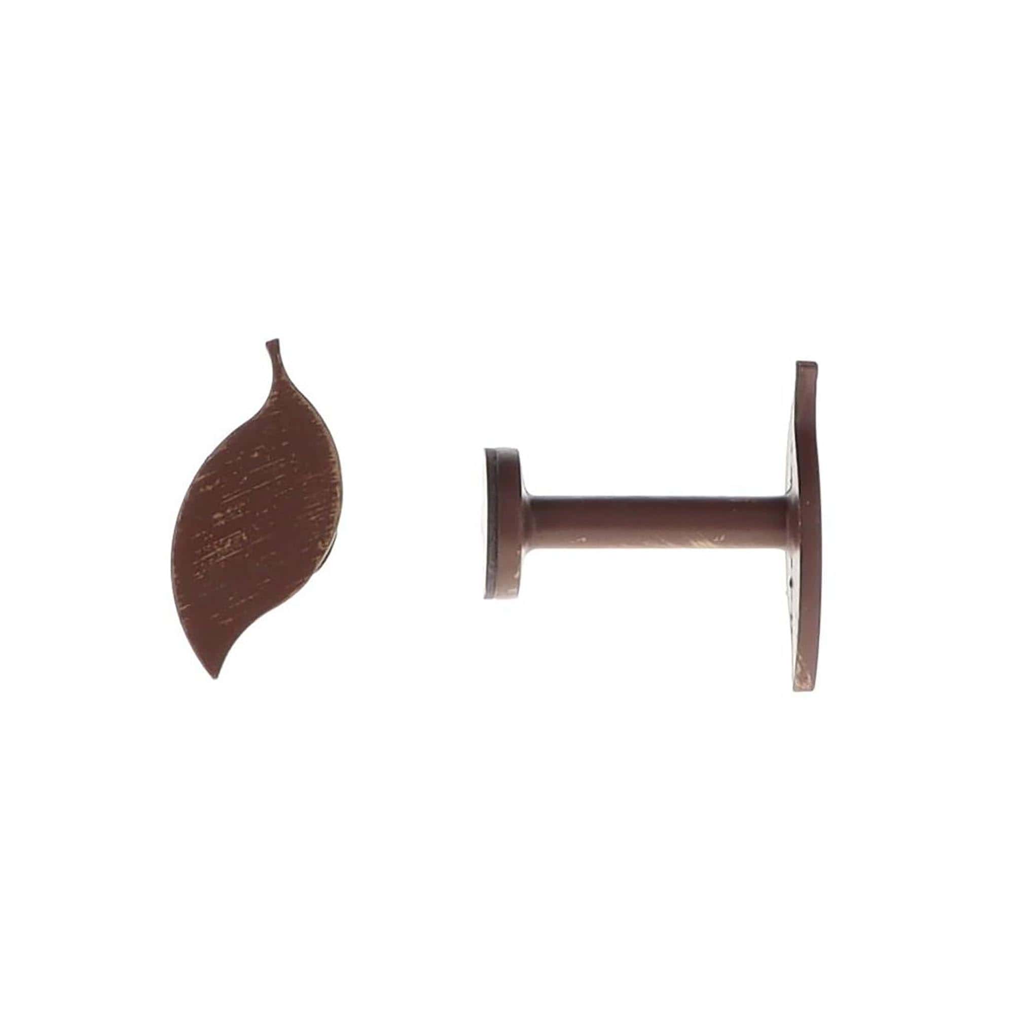 pair of metal hooks for curtain holdbacks in rust and gold with natural design