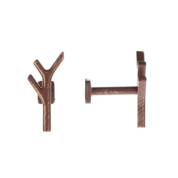 pair of metal hooks for curtain holdbacks in rust and gold with natural design
