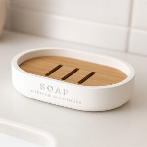 White oval soap dish with slotted bamboo insert close-up