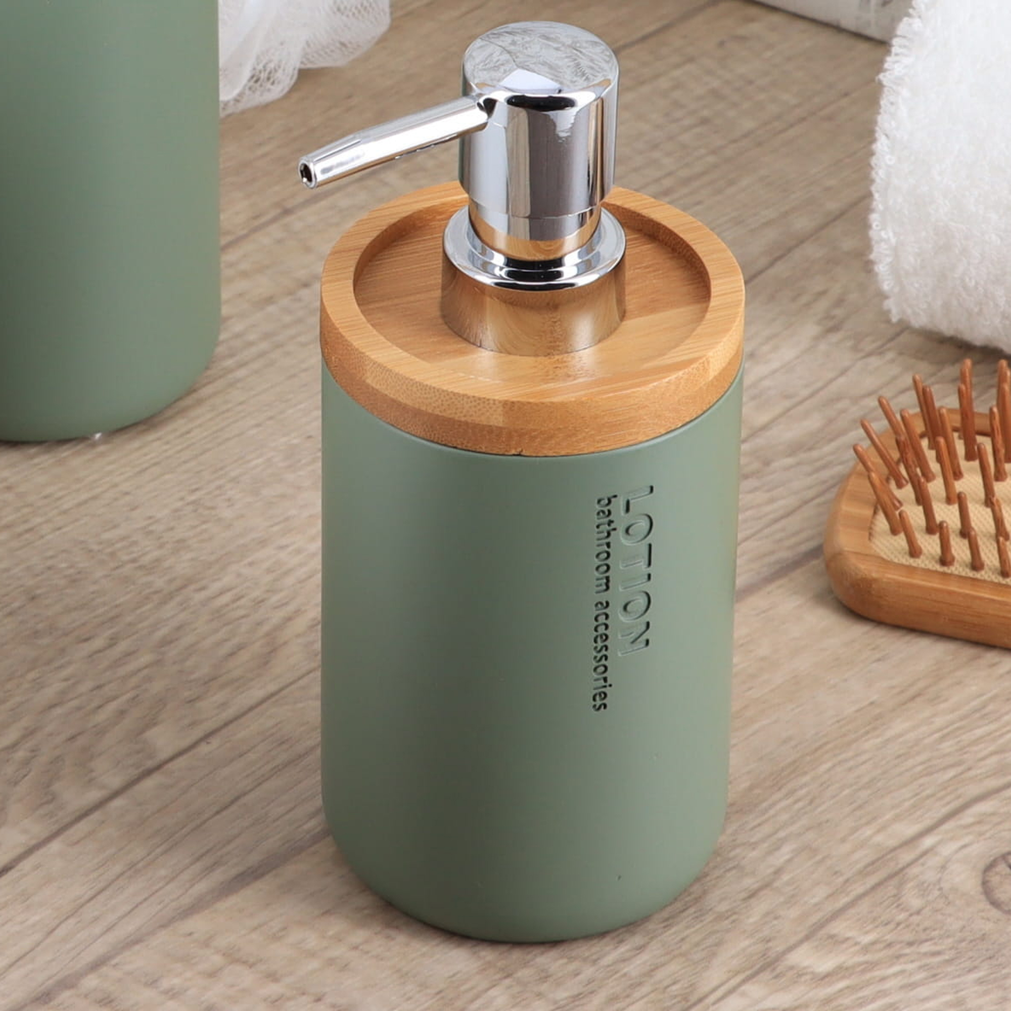 Green dispenser styled on a wooden counter
