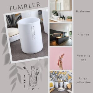 White bathroom tumbler shown for toothbrush makeup brush use