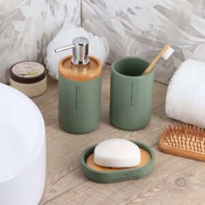 Matching sage green bathroom accessory collection with soap dish