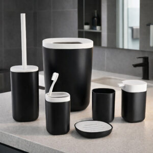Black and white 6-piece bathroom accessories set on counter