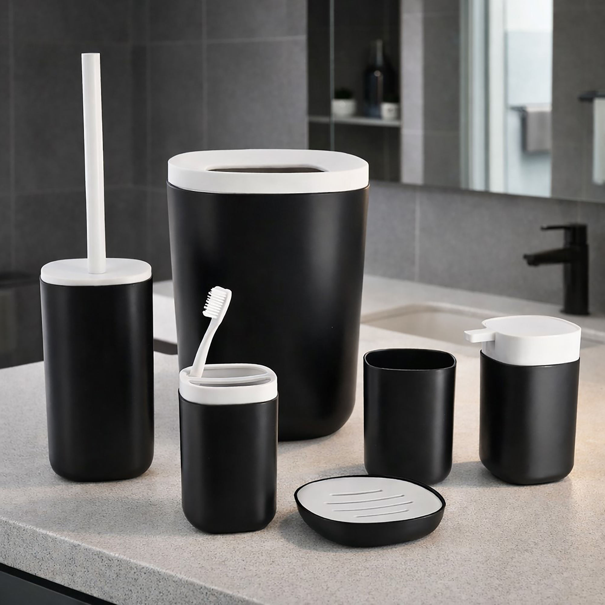 Black and white 6-piece bathroom accessories set on counter