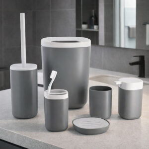 Gray and white 6-piece bathroom accessories set on counter