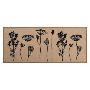 Natural beige floral kitchen runner rug with black botanical stem print of wildflowers and seed heads displayed flat against a warm tan background.