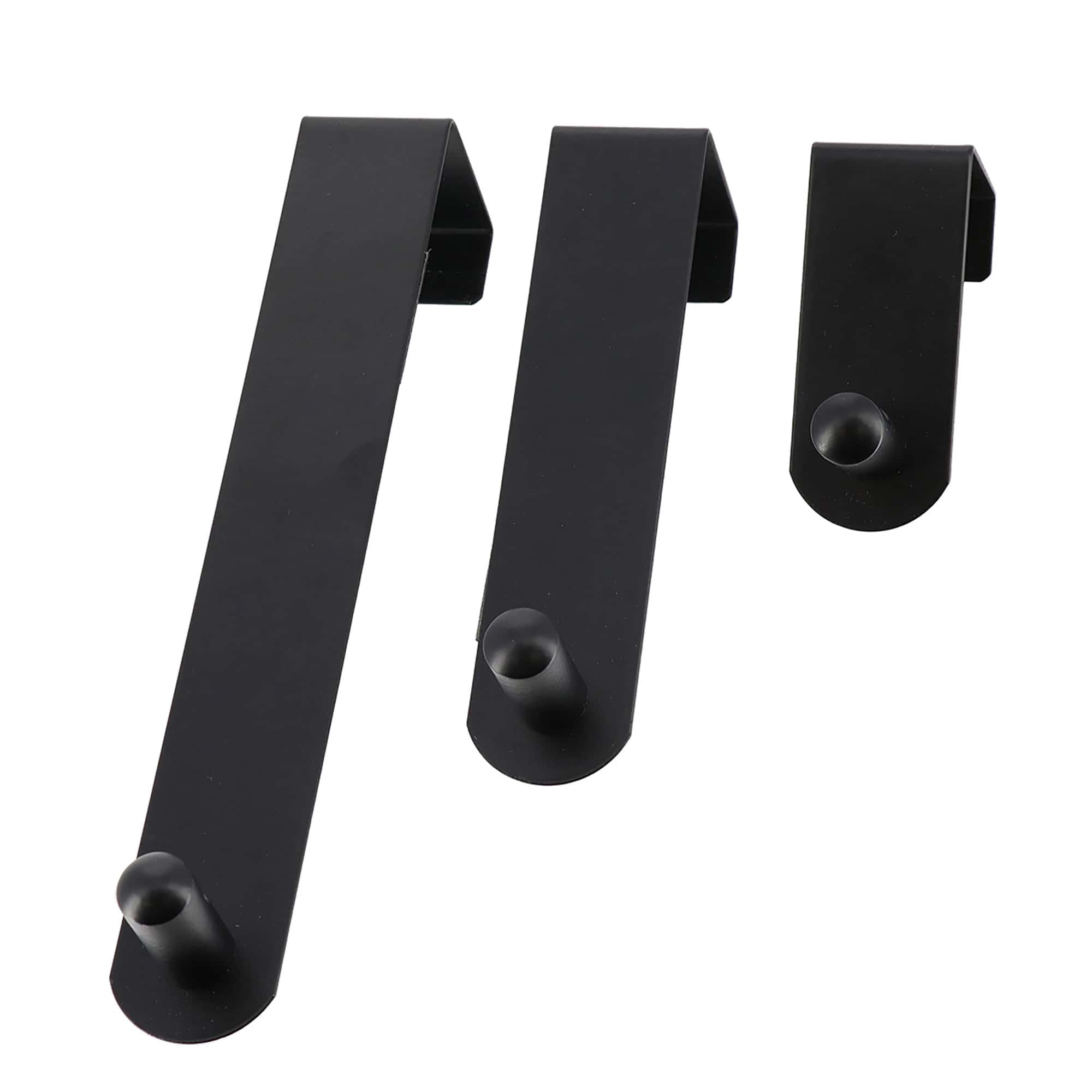 Modern Black Over-the-Door Hook Set: A Selection of Three Matte Black Hooks of Graduated Sizes, Designed for Sleek Functionality, Isolated on a White Background.