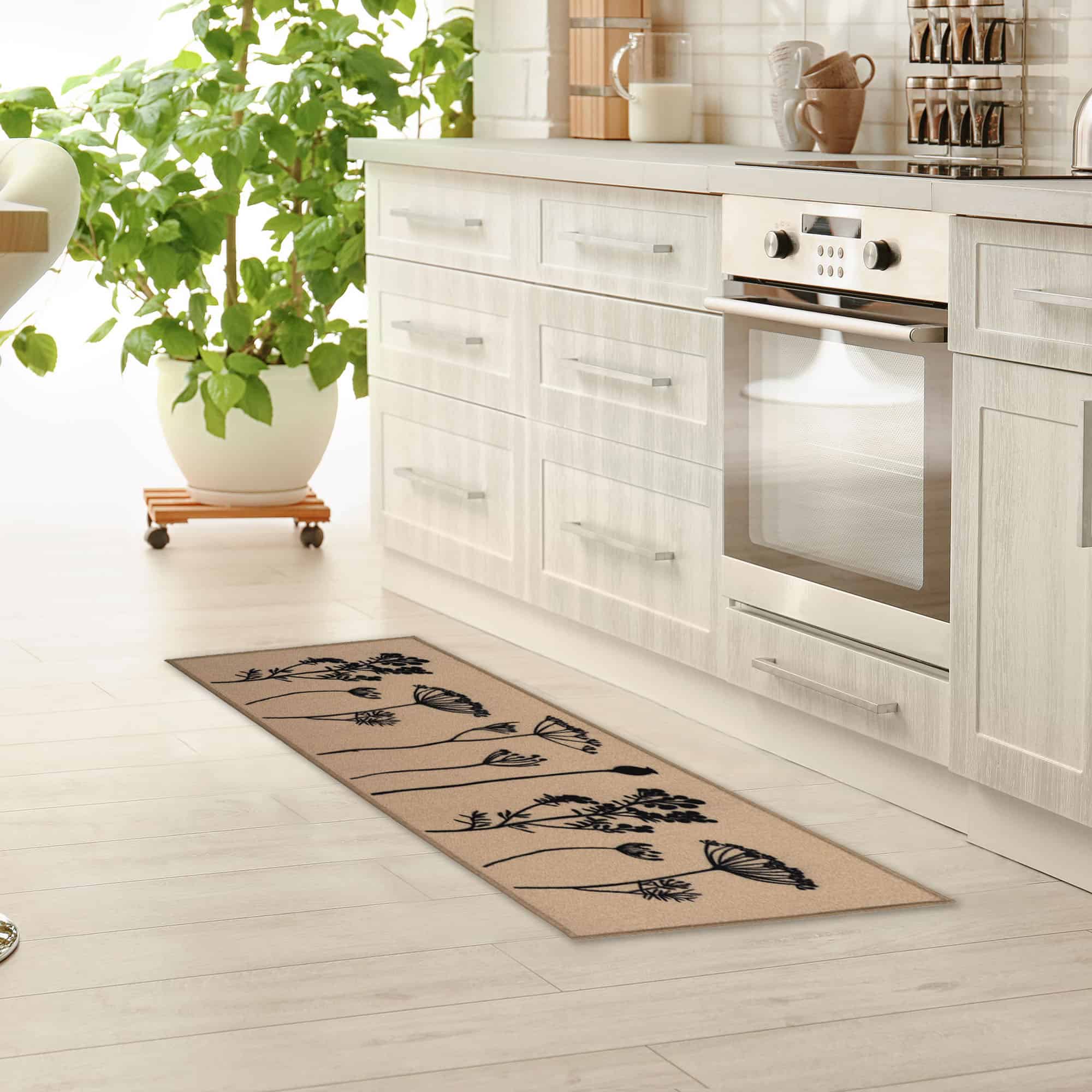 an elegant kitchen with a long runner rug in tan with filed flowers design
