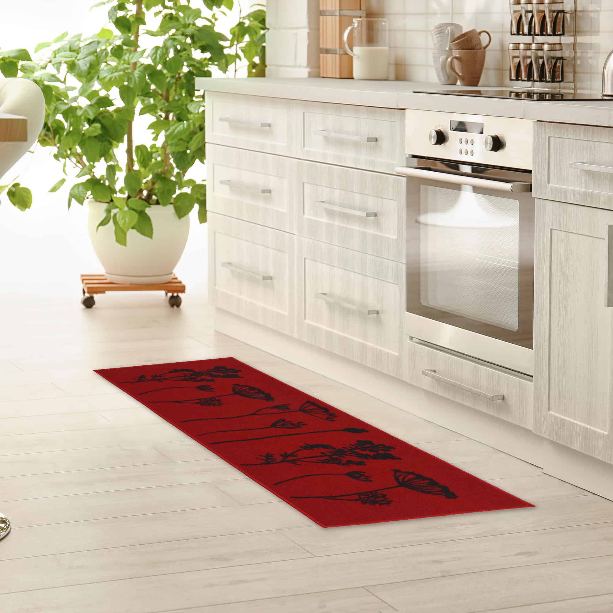 an elegant kitchen with a long runner rug in red with filed flowers design