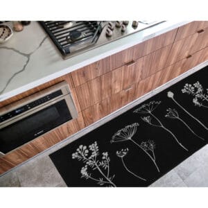 a beautiful black mat in a kitchen with gray floral design