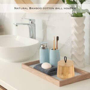 Cotton pad container on a bathroom countertop