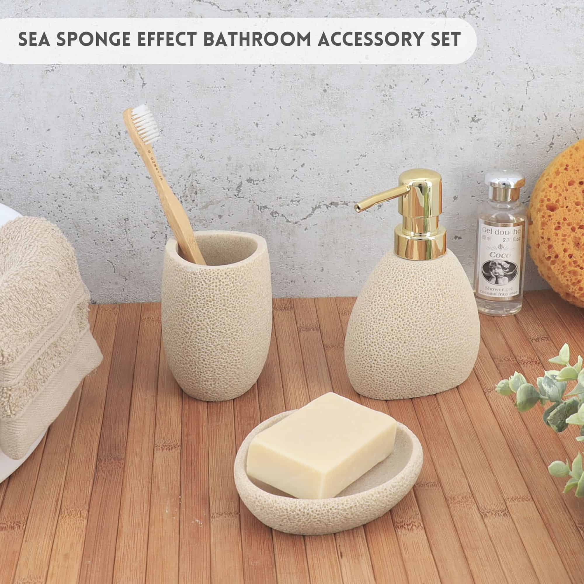 Toothbrush holder, soap dispenser, and soap dish on a bathroom countertop