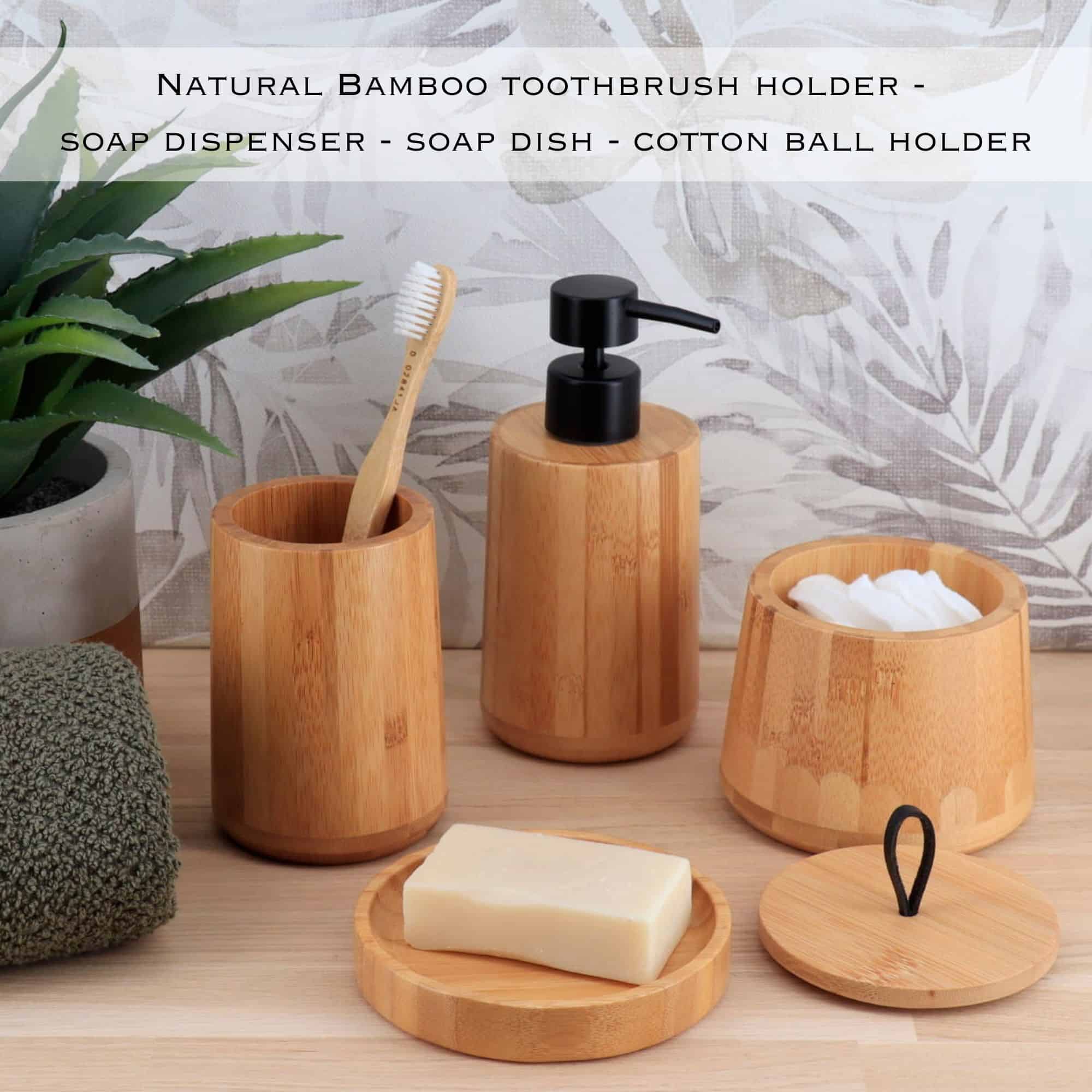 Tumbler cup, soap dispenser, soap dish and cotton ball holder on a countertop