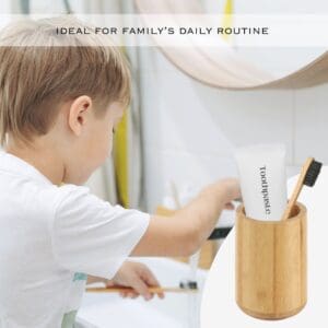 Child using toothbrush with toothbrush holder on the right side