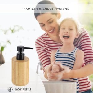 Mom and girl washing hands with soap dispenser on the left
