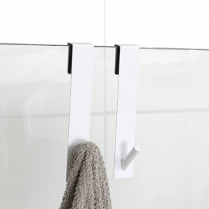 white shower hooks on frameless glass door