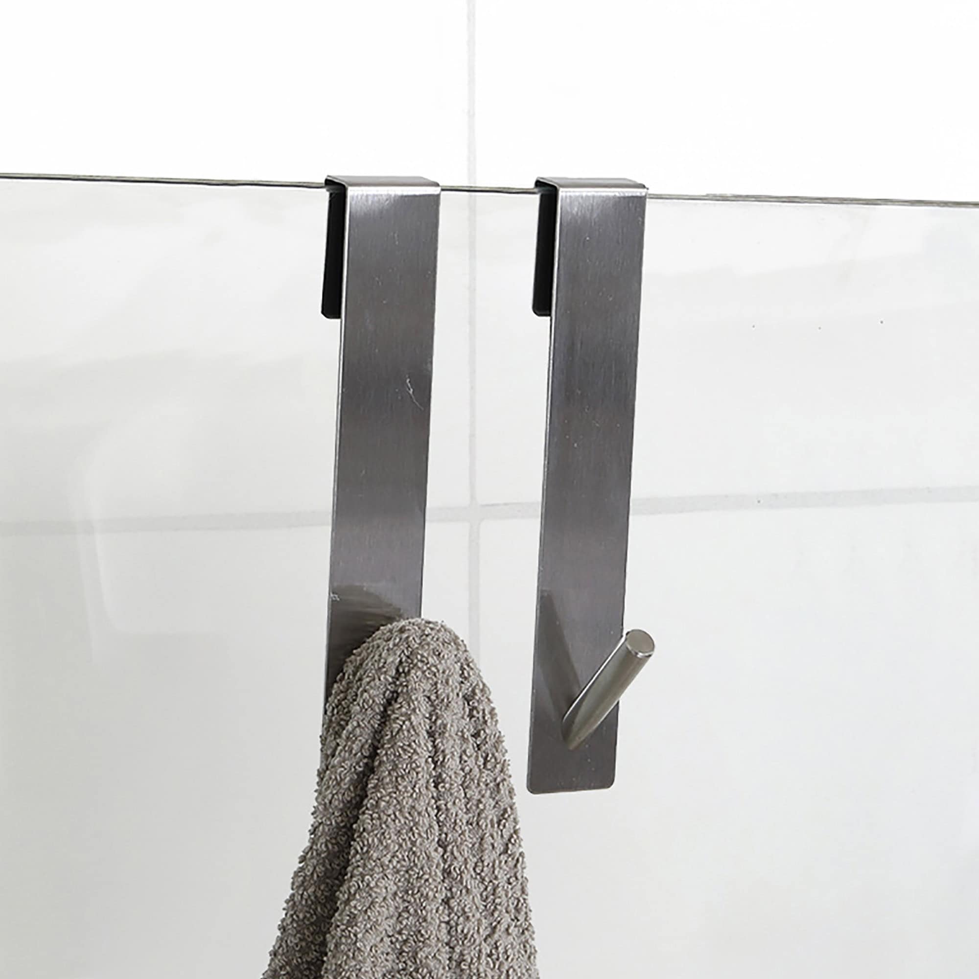 chrome shower hooks on frameless glass door