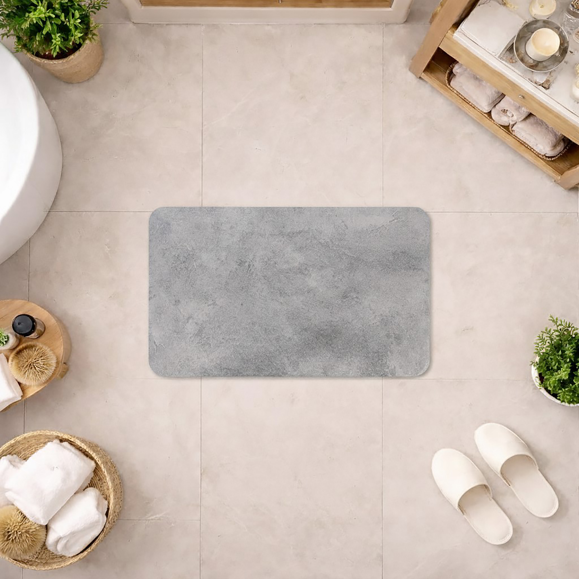 concrete-patterned diatomite bath mat in a modern bathroom