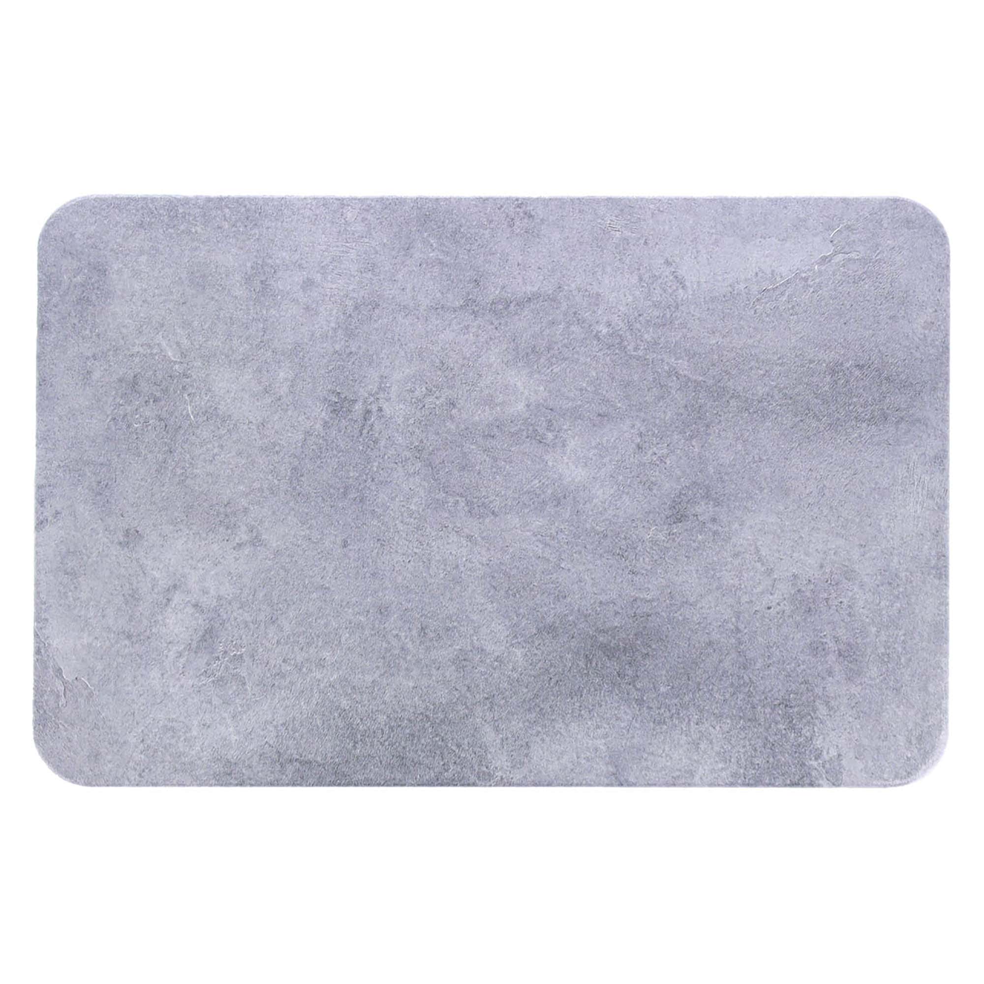 Close-up of a modern concrete-styled diatomite bath mat featuring gray shades