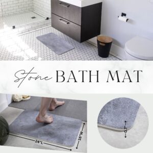 Collage of a stone bath mat in a modern bathroom setting, showing the mat in use, detailed texture close-up, and its dimensions.