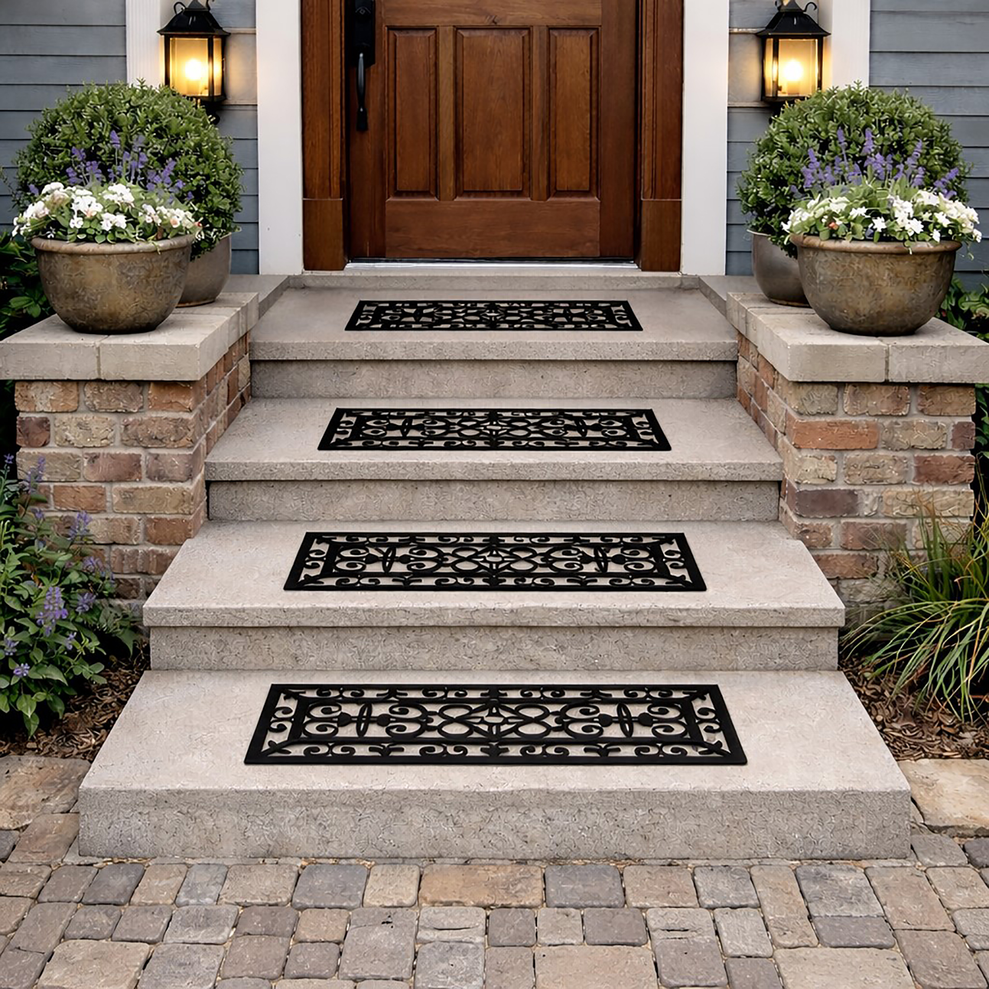 Rubber stair treads with scrollwork on brick steps