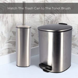 Chrome step trash can paired with matching toilet brush set