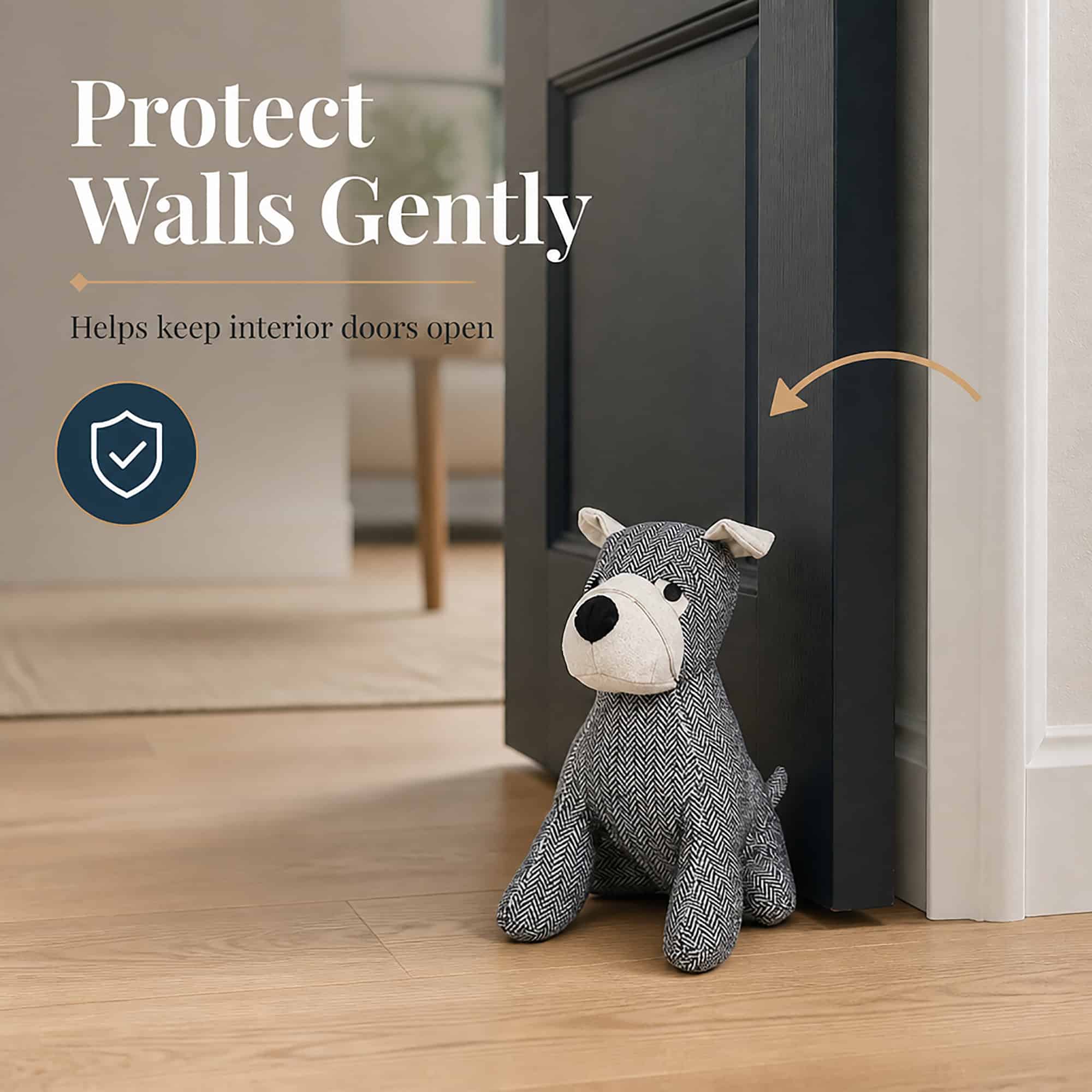 Charcoal dog door stopper holding open a dark door on hardwood floor, with a shield icon and an arrow. On-image text: "Protect Walls Gently," "Helps keep interior doors open."