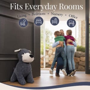 Charcoal plaid dog door stopper propping open a dark door, family embracing in the doorway behind, with four room icons. On-image text: "Fits Everyday Rooms," "Living," "Bedroom," "Nursery," "Office."